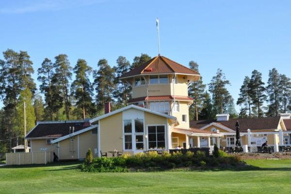 ett golfklubbhus i gult
