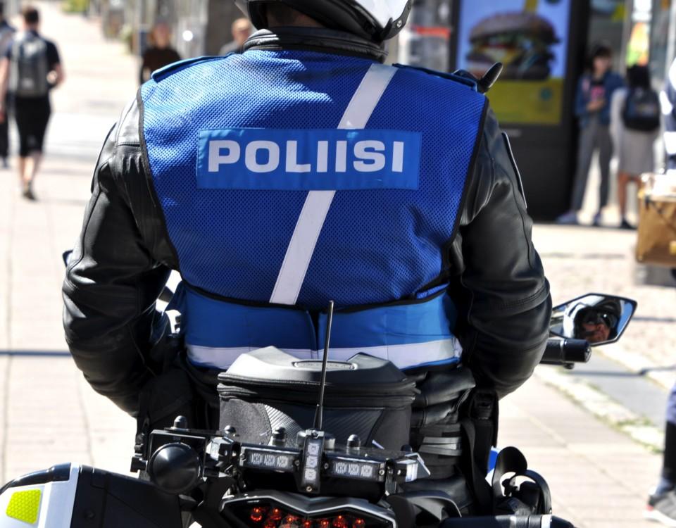 polis på motorcykel
