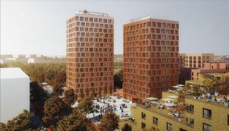 visionsbild av två höga hus med många fönsterrutor