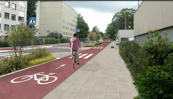 visionsbild av gata med röda cykelfiler