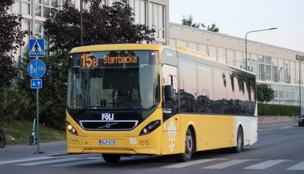 Kollektivtrafikbuss i gult och vitt